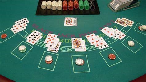 Perbedaan antara bermain blackjack di mesin token vs bermain blackjack